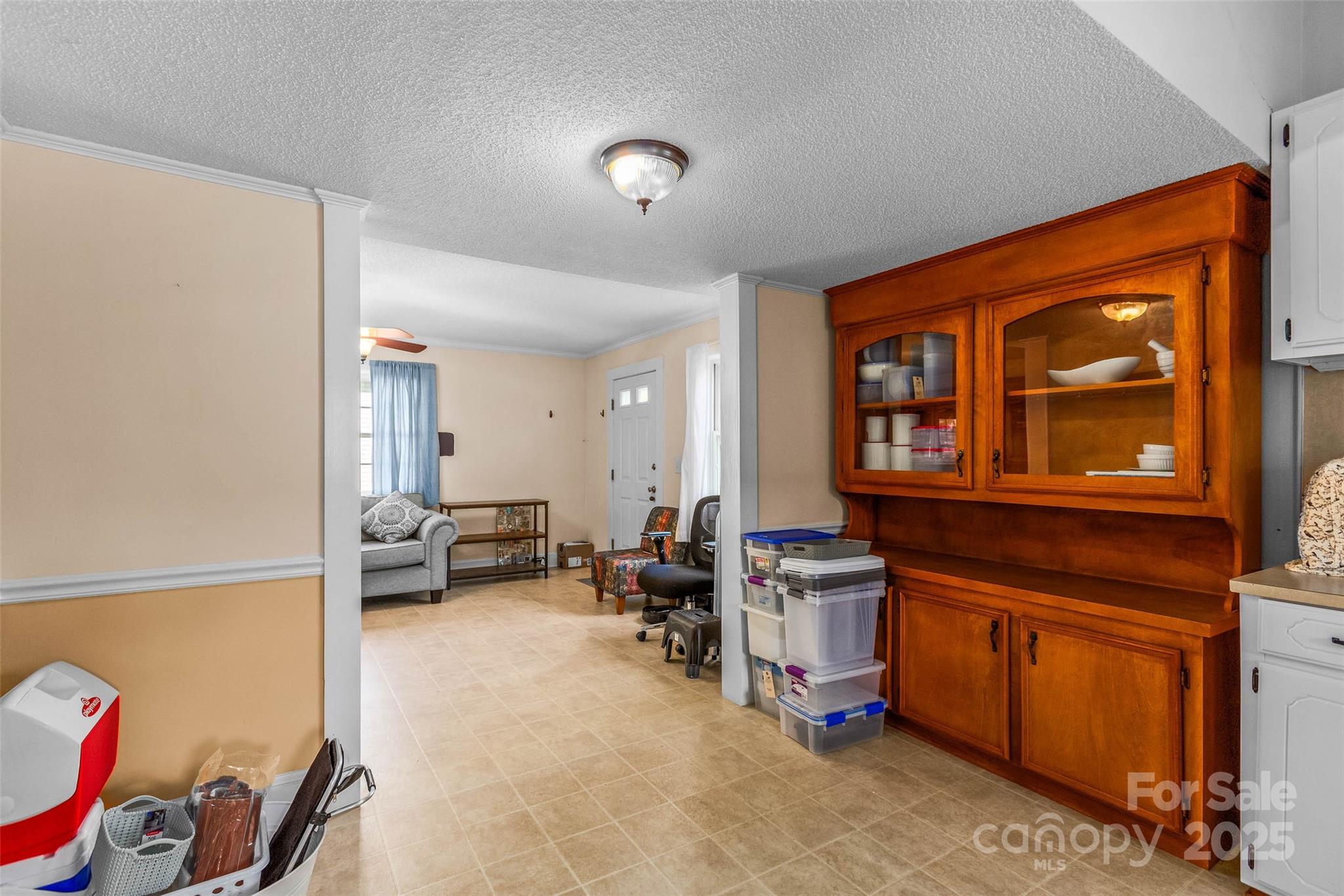 304 South Walnut Street Kannapolis, NC 28081 - Photo 21 of 32 a view of a livingroom with workspace and a window
