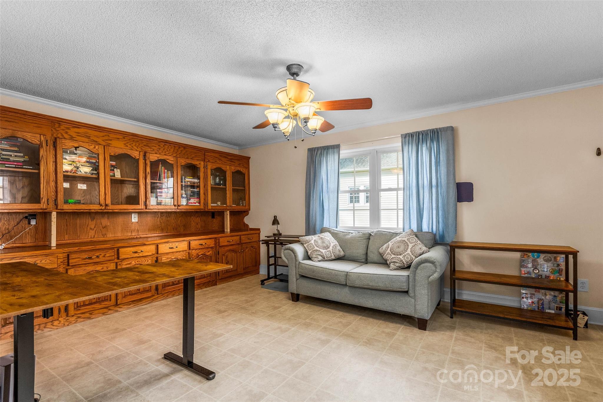 304 South Walnut Street Kannapolis, NC 28081 - Photo 22 of 32 a living room with furniture and a window