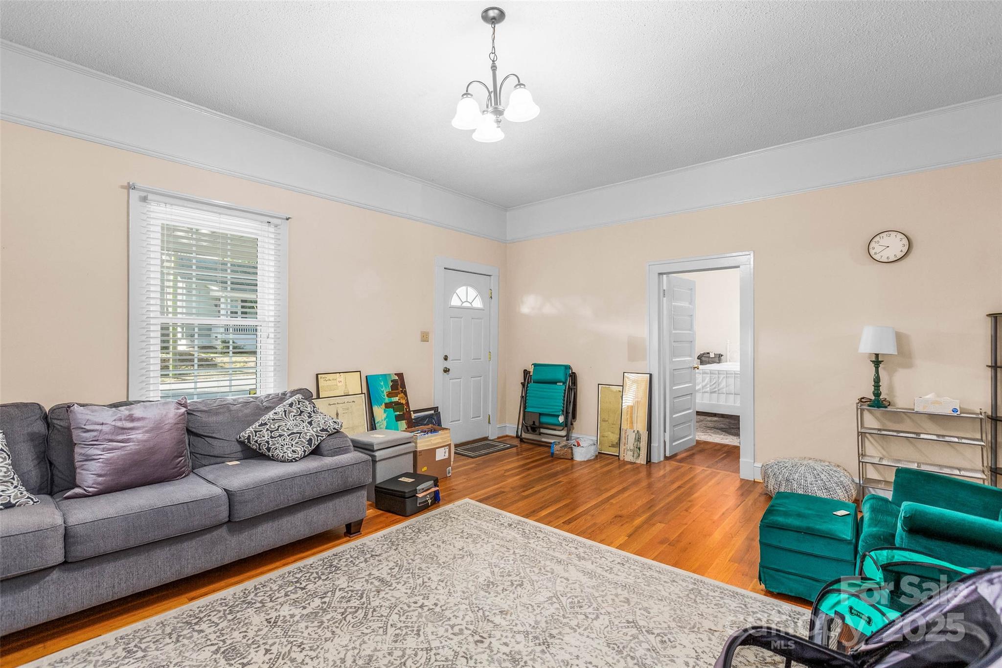 304 South Walnut Street Kannapolis, NC 28081 - Photo 9 of 32 a living room with furniture and a window