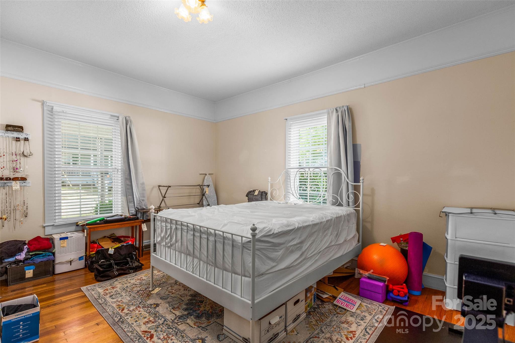 304 South Walnut Street Kannapolis, NC 28081 - Photo 10 of 32 a bedroom with a bed and a window