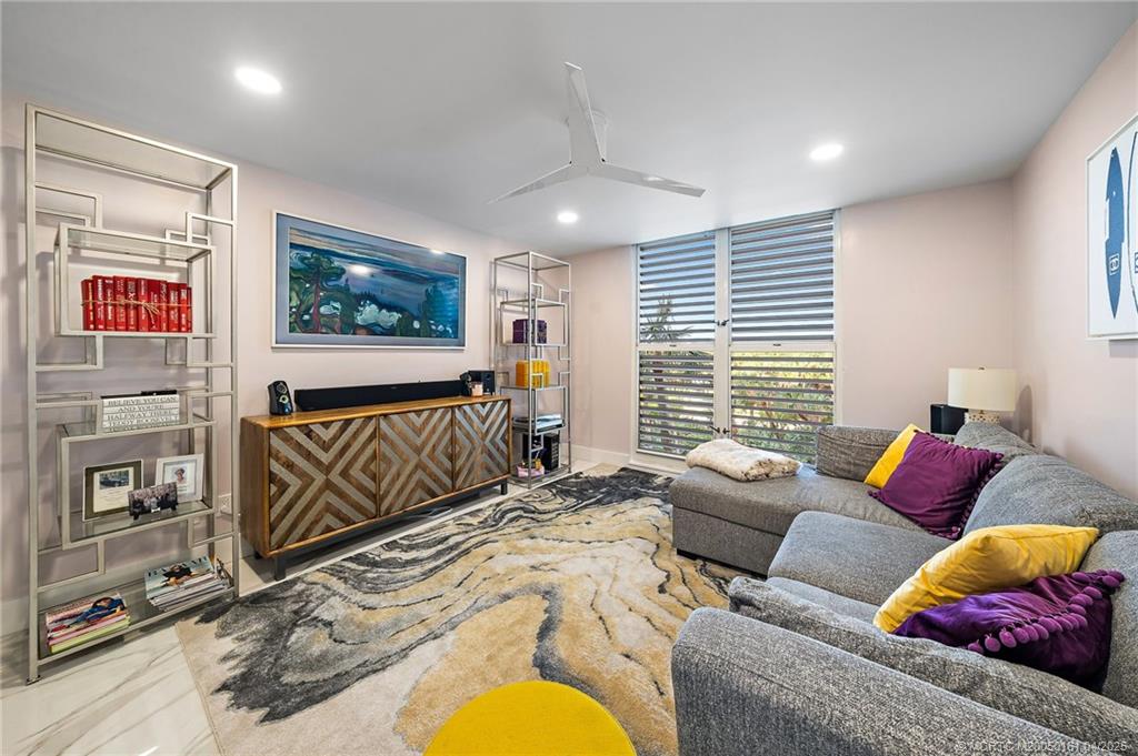 669 Northeast Plantation Road, Unit 201 Stuart, FL 34996 - Photo 30 of 37 a living room with furniture