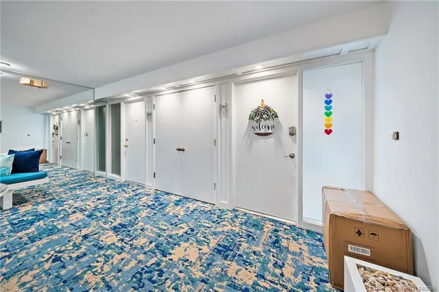 a spacious bathroom with a double vanity sink and a mirror