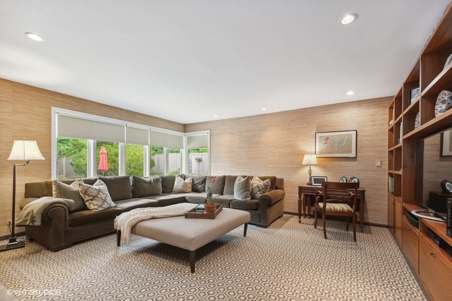 535 Dundee Road Glencoe, IL 60022 - Photo 14 of 37 a living room with furniture and a flat screen tv