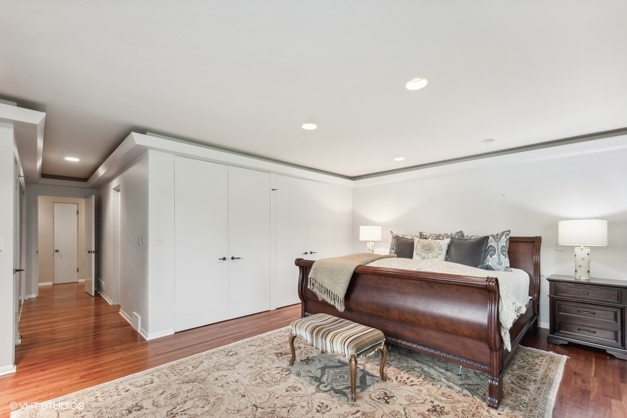 535 Dundee Road Glencoe, IL 60022 - Photo 20 of 37 a bedroom with furniture and wooden floor