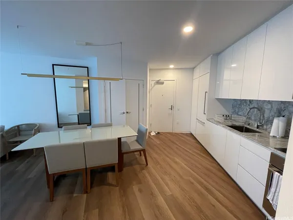a room with a bed and a table in it