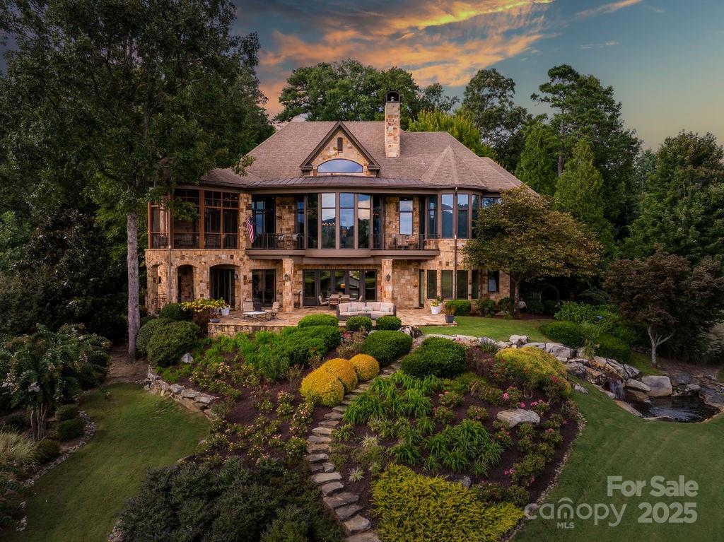15 Water View Court Travelers Rest, SC 29690 - Photo 2 of 48 a front view of a house with garden