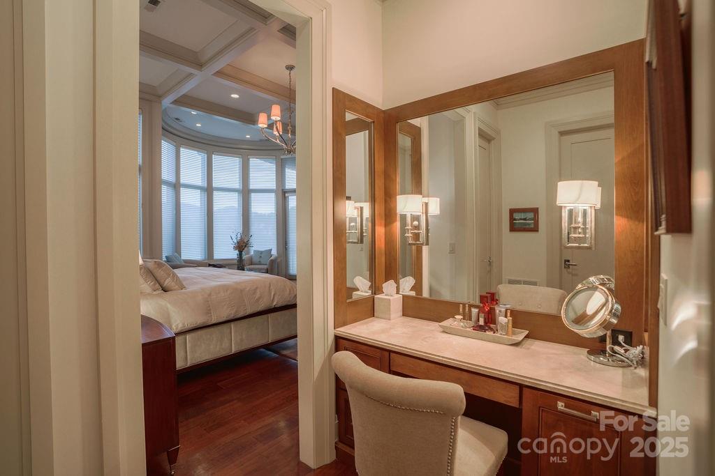 15 Water View Court Travelers Rest, SC 29690 - Photo 24 of 48 a bedroom with a bed and wooden floor