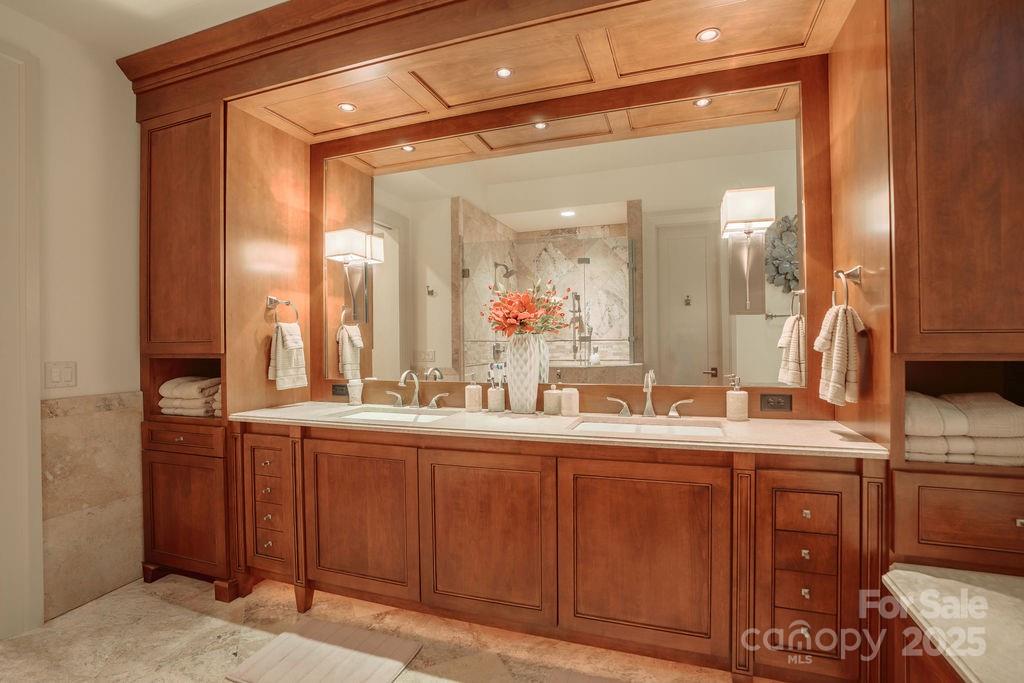 15 Water View Court Travelers Rest, SC 29690 - Photo 26 of 48 a bathroom with a double vanity sink and a mirror