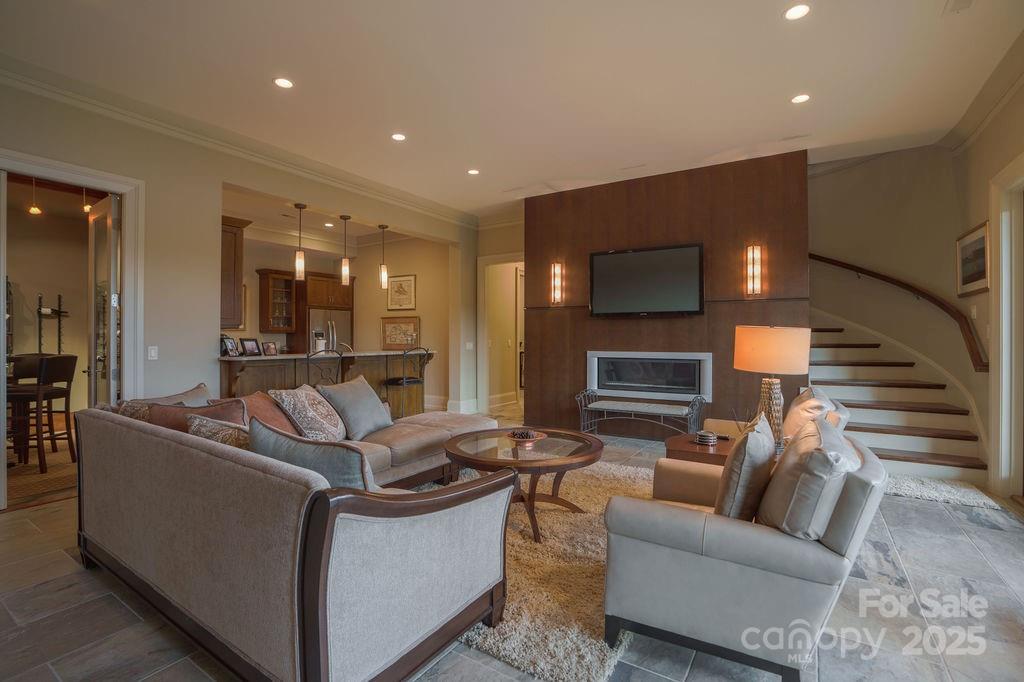 15 Water View Court Travelers Rest, SC 29690 - Photo 28 of 48 a living room with furniture and a flat screen tv