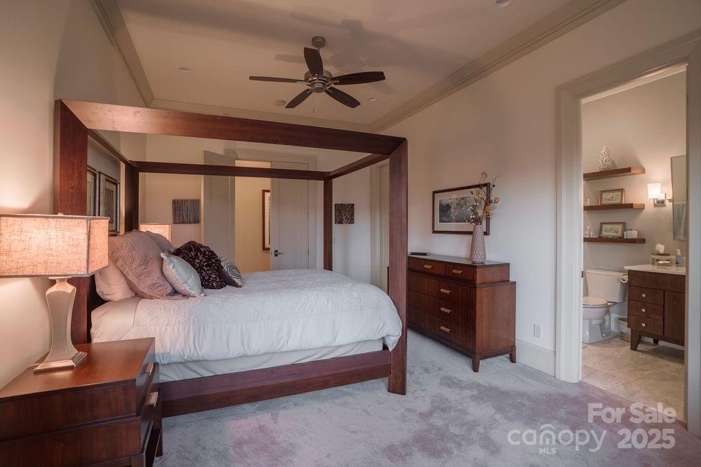 15 Water View Court Travelers Rest, SC 29690 - Photo 35 of 48 a bedroom with a bed and cabinets