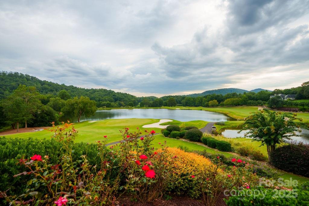 15 Water View Court Travelers Rest, SC 29690 - Photo 48 of 48 a view of a lake with a swimming pool and outdoor seating