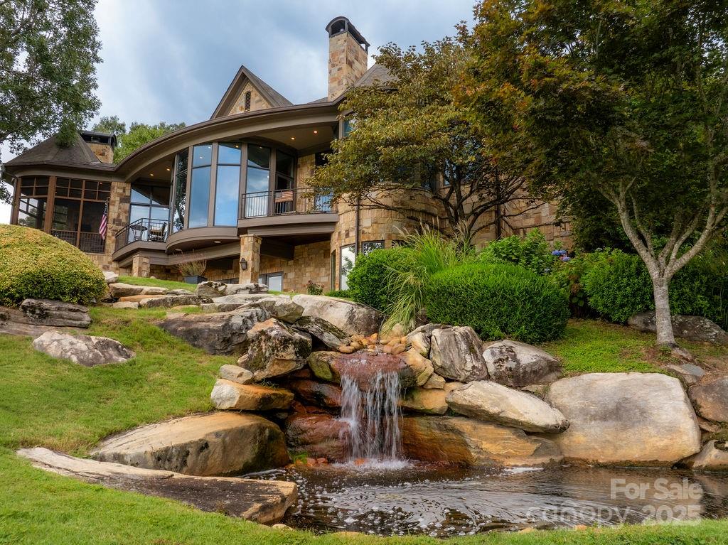 15 Water View Court Travelers Rest, SC 29690 - Photo 6 of 48 a view of a house with backyard and sitting area