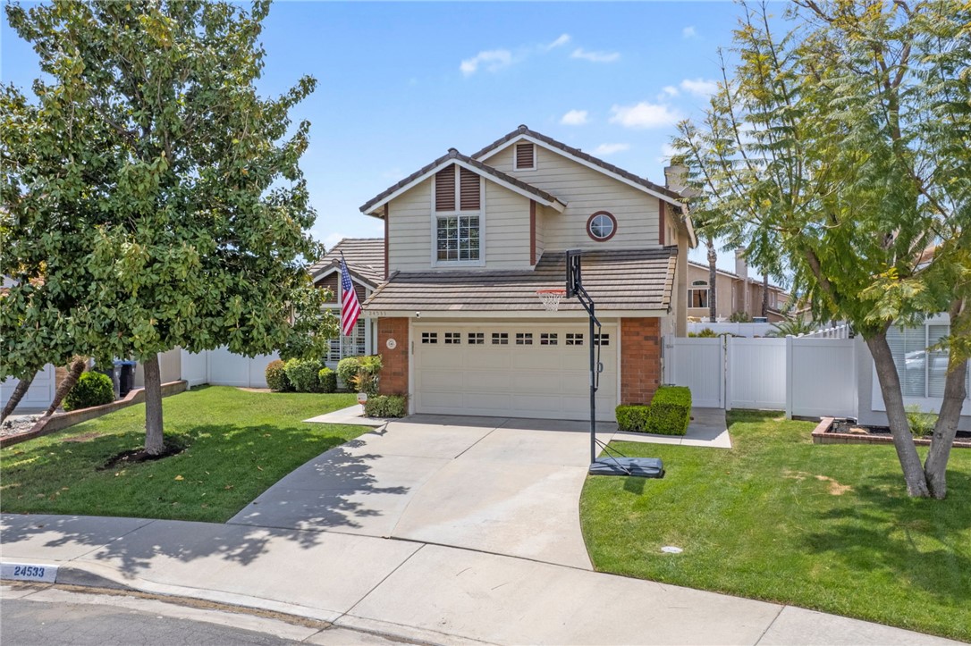 24533 Ridgewood Road Murrieta, CA 92562 - Photo 1 of 1 a view of a house with a yard