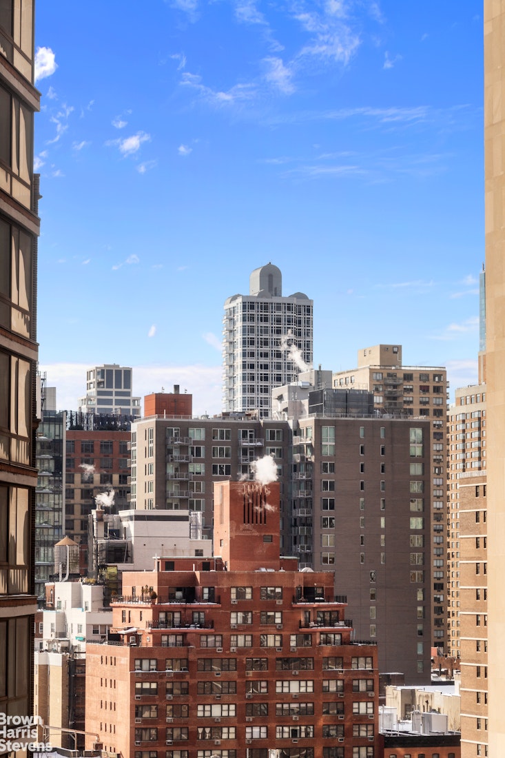 300 East 40th Street, Unit 12P Manhattan, NY 10016 - Photo 4 of 13 a city view with tall buildings