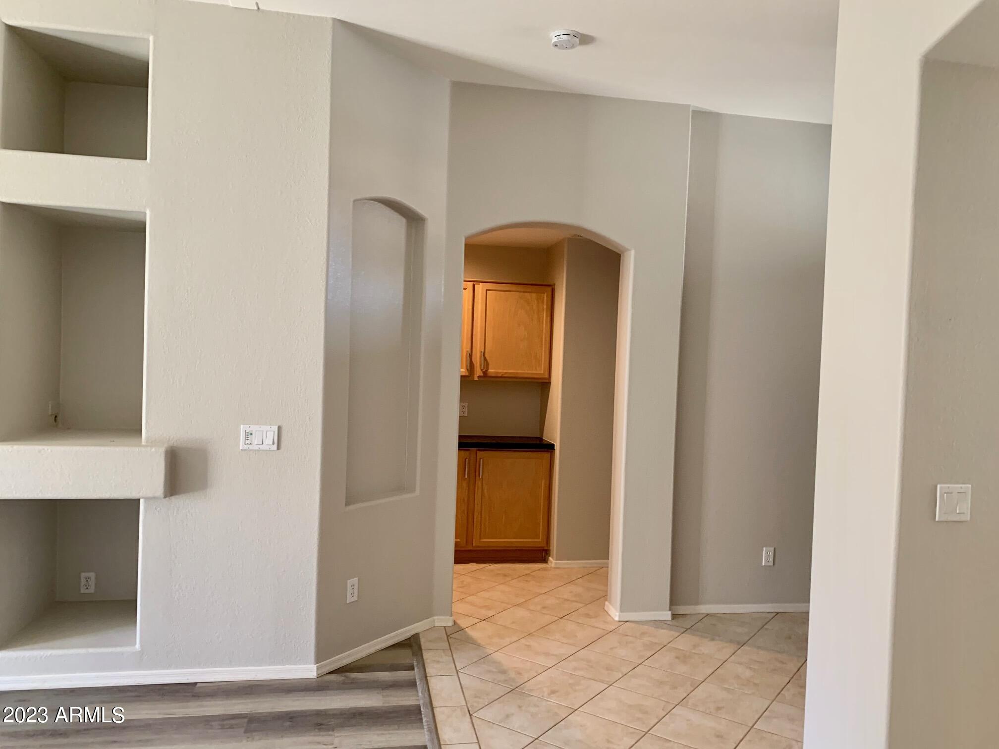 1655 East Harrison Street Chandler, AZ 85225 - Photo 17 of 35 a view of a hallway with wooden floor