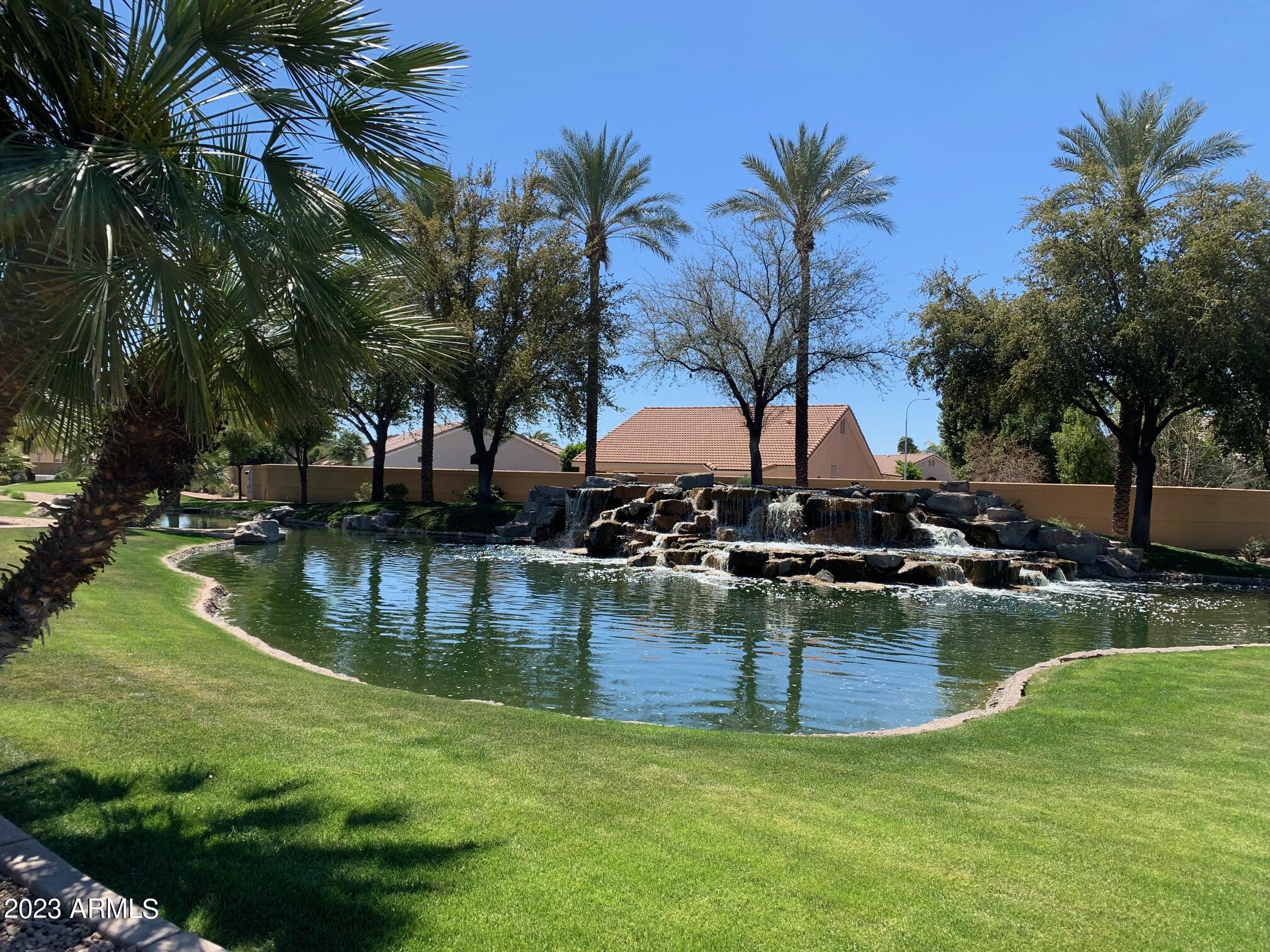 1655 East Harrison Street Chandler, AZ 85225 - Photo 34 of 35 a view of a swimming pool with a table and chairs