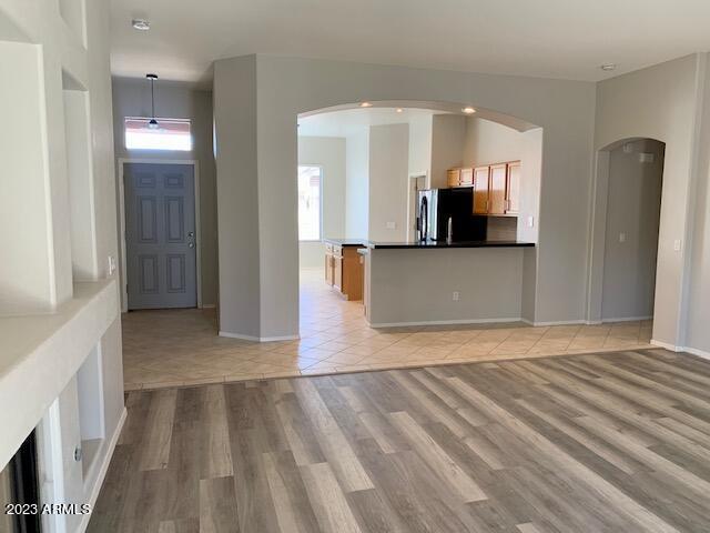 1655 East Harrison Street Chandler, AZ 85225 - Photo 10 of 35 a view of a kitchen with a sink and a refrigerator