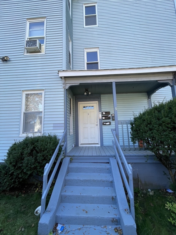 5 Freeland Terrace Worcester, MA 01603 - Photo 2 of 35 a front view of a house with stairs
