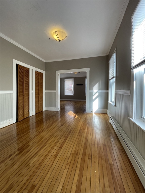 5 Freeland Terrace Worcester, MA 01603 - Photo 9 of 35 a view of empty room with a fireplace and wooden floor