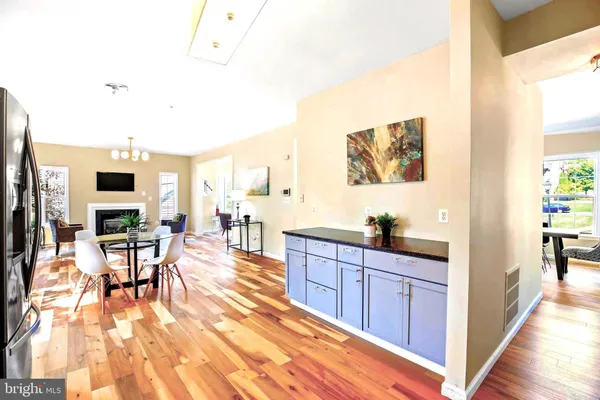 a view of a kitchen and dining room