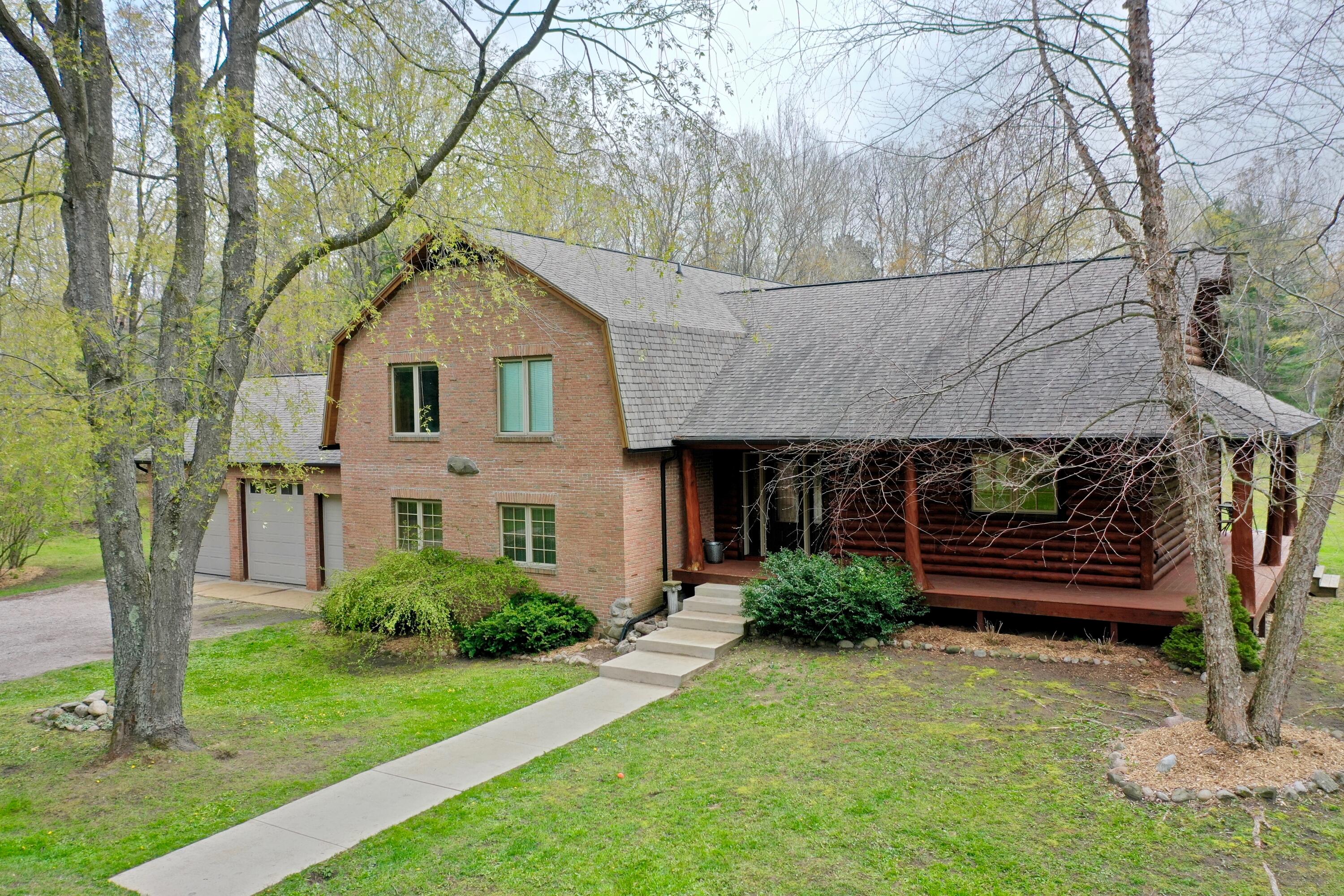 7913 Quarter Road Cadillac, MI 49601 - Photo 2 of 53 DJI_0233
