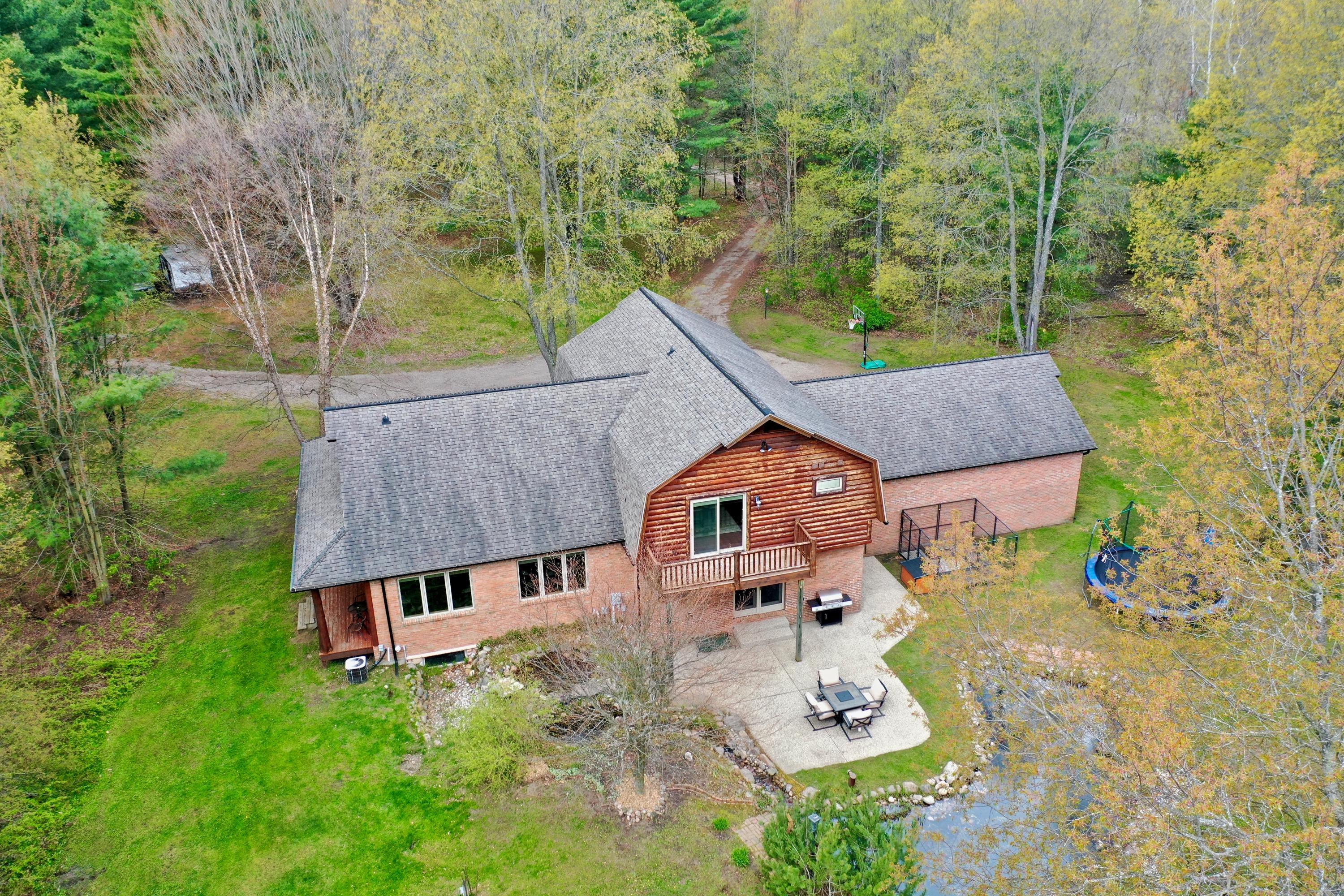 7913 Quarter Road Cadillac, MI 49601 - Photo 3 of 53 DJI_0221