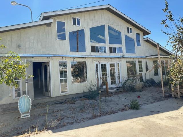 413 South 5th Street Fowler, CA 93625 - Photo 18 of 18 a front view of a house with garden
