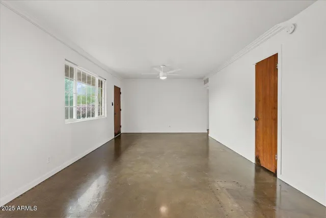 an empty room with windows