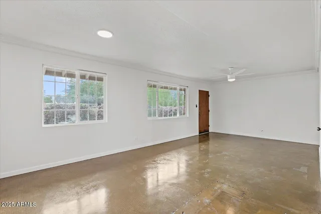 an empty room with windows