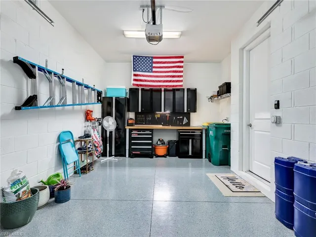a aerial view of a house with swimming pool yard and outdoor seating