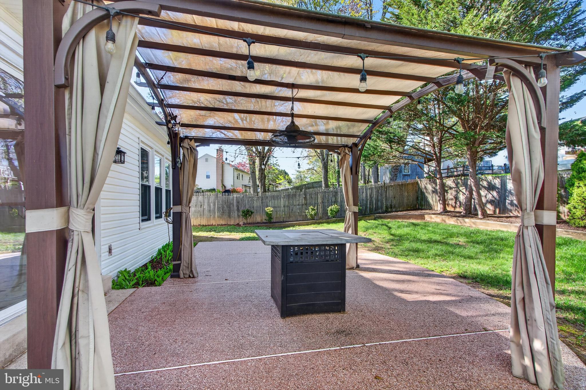 16 Redding Ridge Drive Gaithersburg, MD 20878 - Photo 53 of 53 Charming outdoor retreat with pergola.