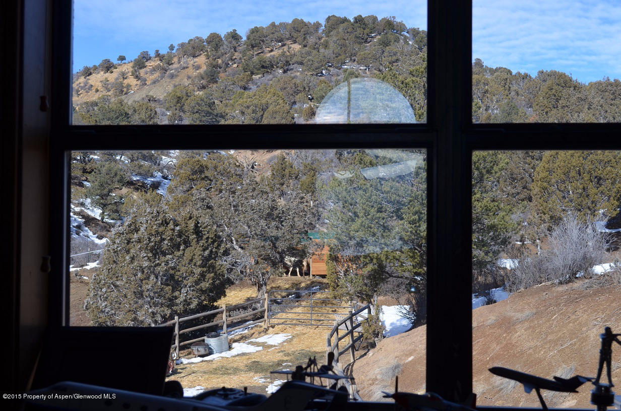 142 Happy Dog Trail Rifle, CO 81650 - Photo 14 of 39 a view of sky from window