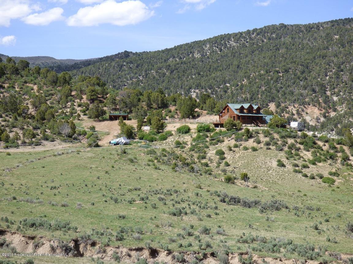 142 Happy Dog Trail Rifle, CO 81650 - Photo 36 of 39 a view of a houses with a yard
