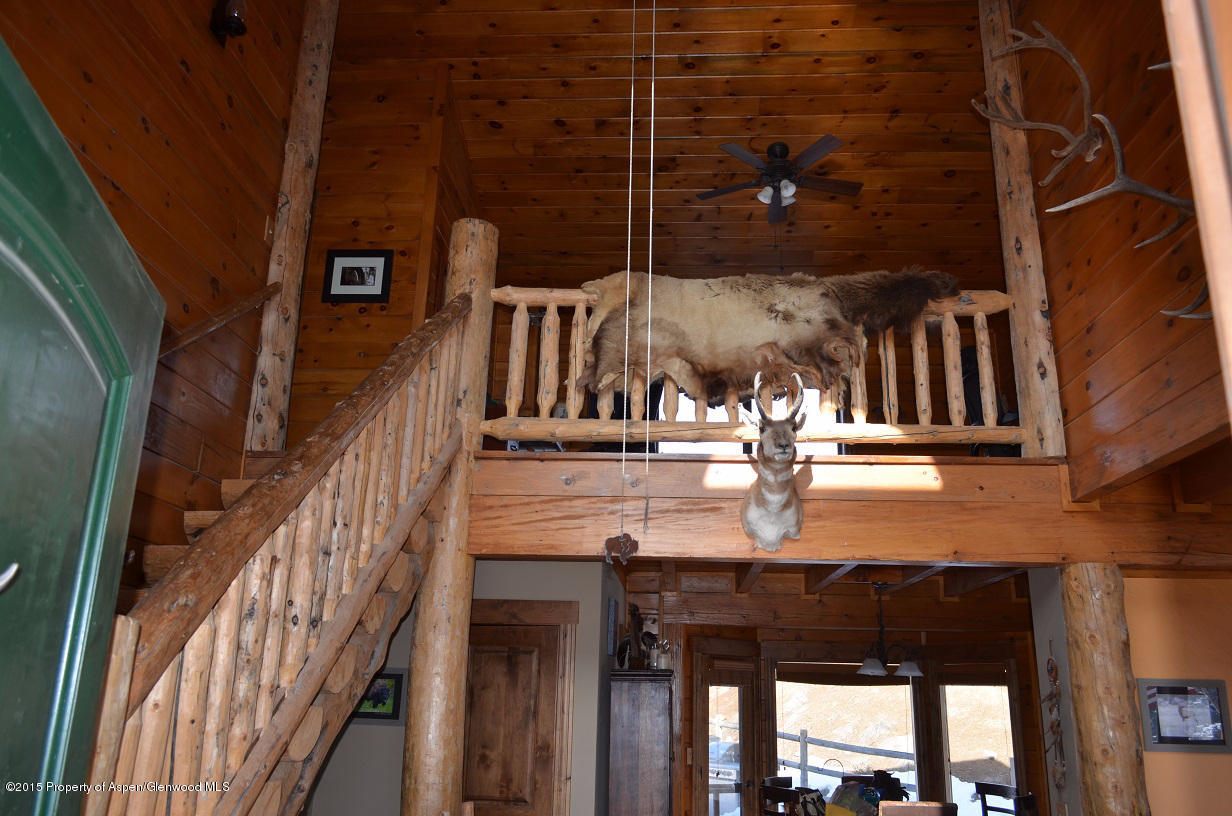 142 Happy Dog Trail Rifle, CO 81650 - Photo 4 of 39 a view of entryway and hall with wooden floor