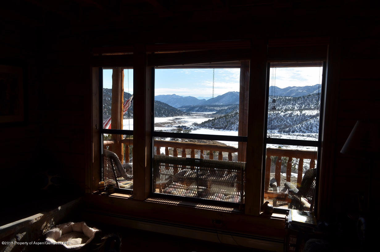 142 Happy Dog Trail Rifle, CO 81650 - Photo 6 of 39 a room with lots of wooden floor