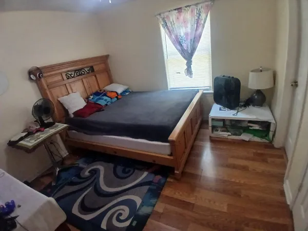 a view of outdoor space with wooden fence