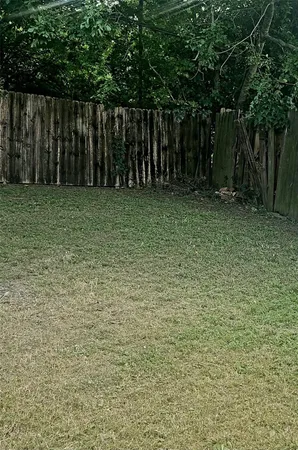a view of backyard of house