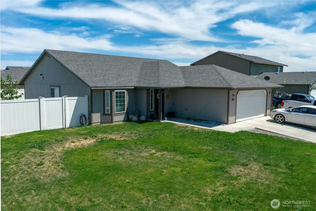 a house view with a garden space