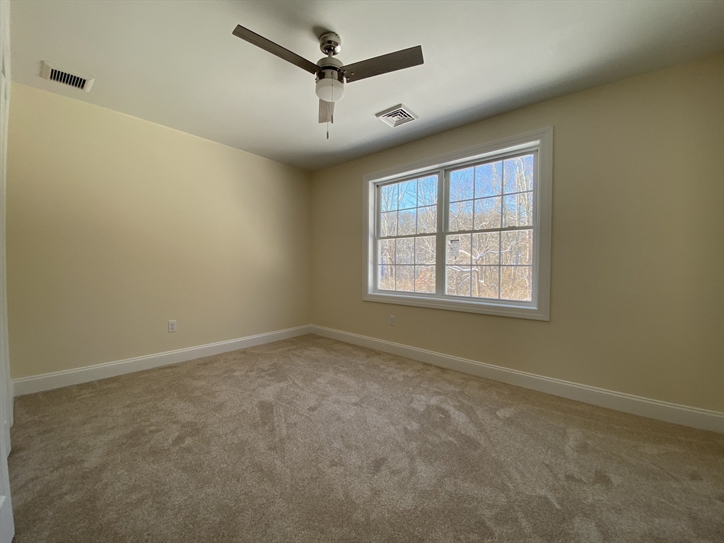 855 County Street, Unit 2 Attleboro, MA 02703 - Photo 18 of 27 an empty room with a window