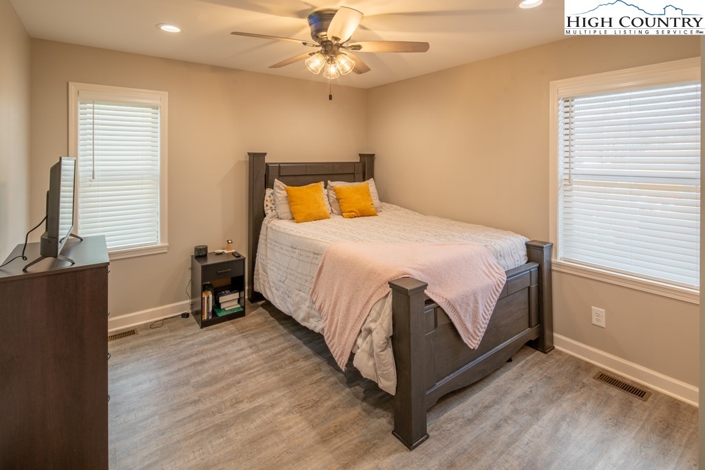 575 Townhomes Place, Unit 34 Boone, NC 28607 - Photo 17 of 32 a bedroom with a bed and a window
