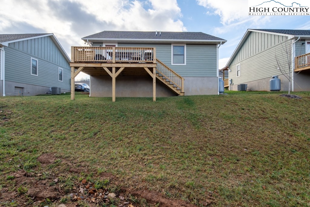575 Townhomes Place, Unit 34 Boone, NC 28607 - Photo 27 of 32 front view of a house with a yard
