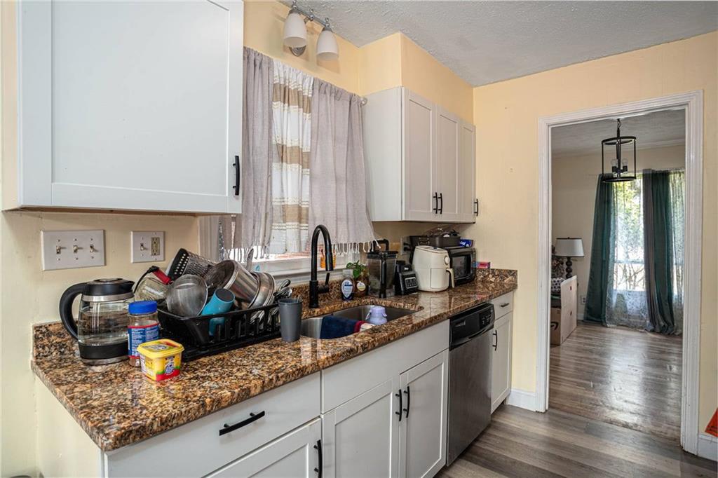 80 Stagecoach Circle Stockbridge, GA 30281 - Photo 15 of 38 a view of a kitchen with sink and cabinets
