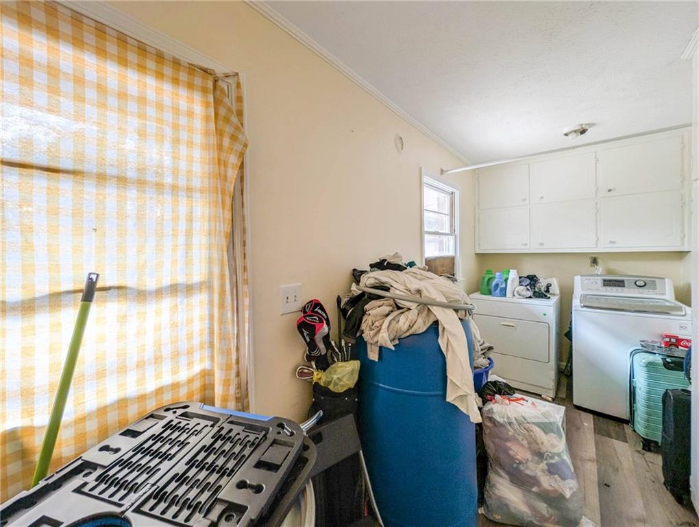 80 Stagecoach Circle Stockbridge, GA 30281 - Photo 17 of 38 a view of a kitchen with fridge and workspace