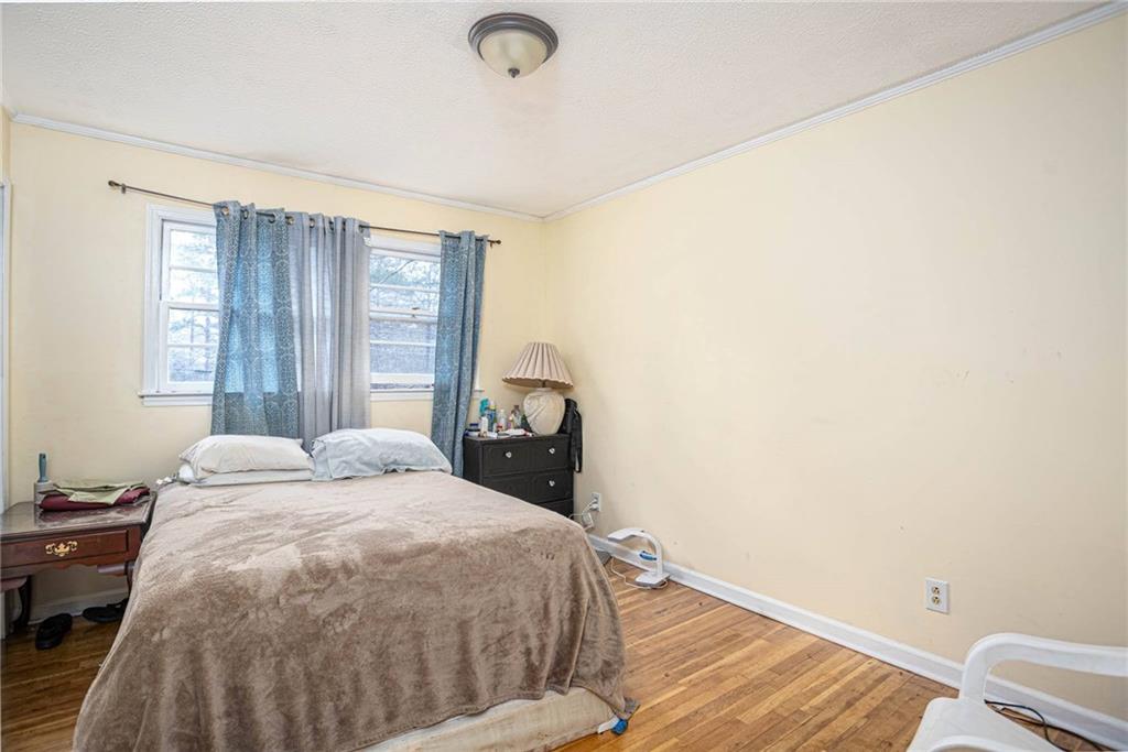 80 Stagecoach Circle Stockbridge, GA 30281 - Photo 18 of 38 a bedroom with a bed and a window