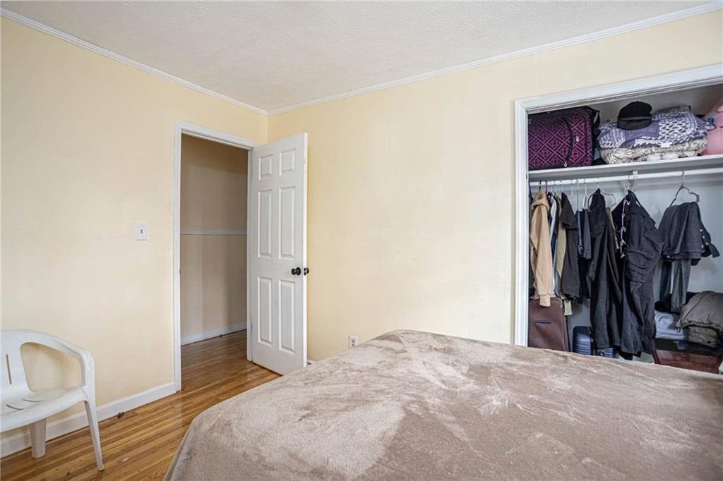 80 Stagecoach Circle Stockbridge, GA 30281 - Photo 19 of 38 a bed room with a bed and a closet