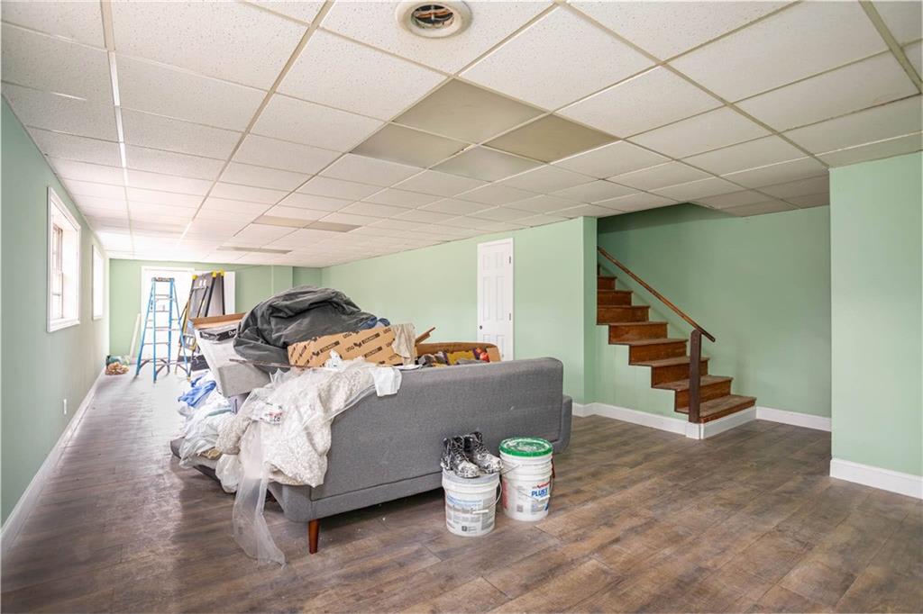 80 Stagecoach Circle Stockbridge, GA 30281 - Photo 29 of 38 a living room with furniture and wooden floor