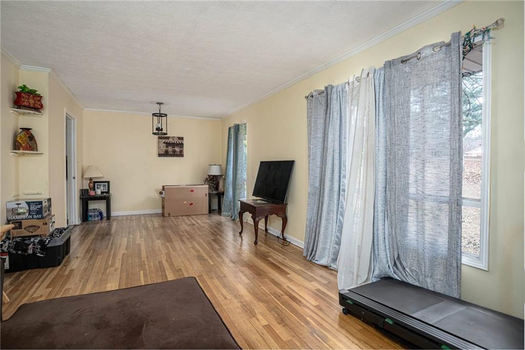 80 Stagecoach Circle Stockbridge, GA 30281 - Photo 7 of 38 a living room with furniture and a flat screen tv
