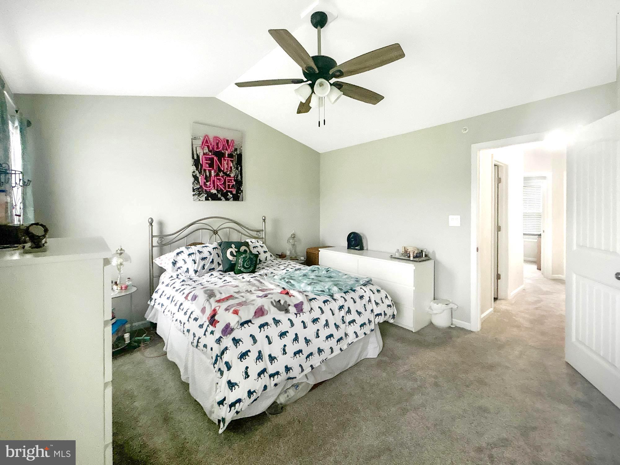 144 Overlook Dr. Hanover, PA 17331 - Photo 13 of 26 a bedroom with bed and a chandelier