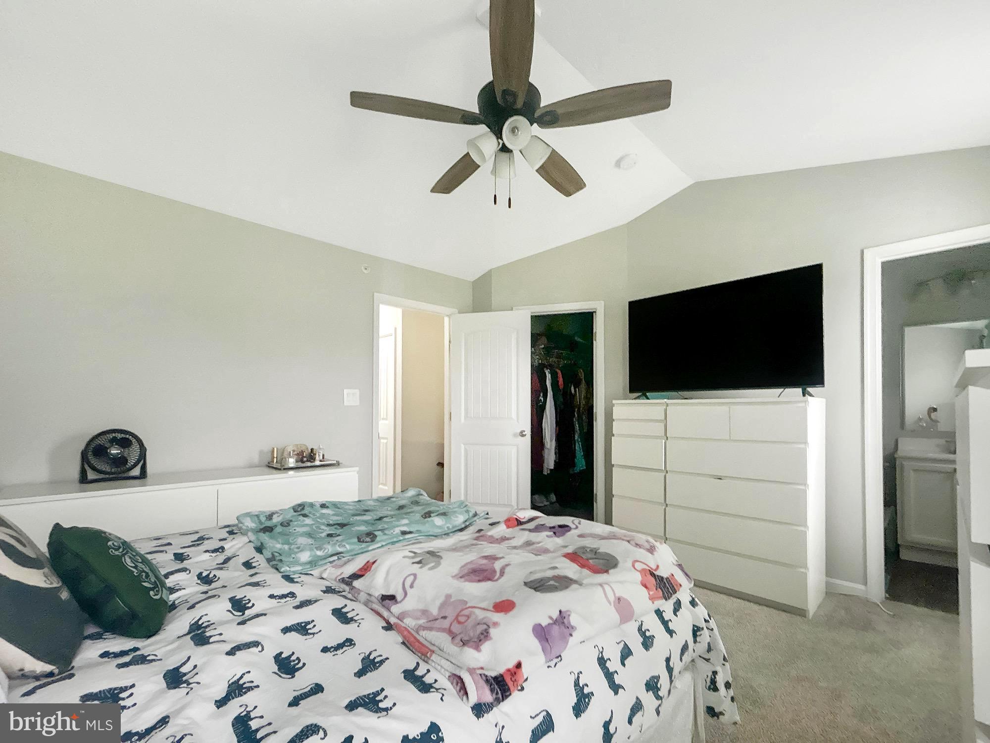 144 Overlook Dr. Hanover, PA 17331 - Photo 15 of 26 a bedroom with a bed and a flat screen tv