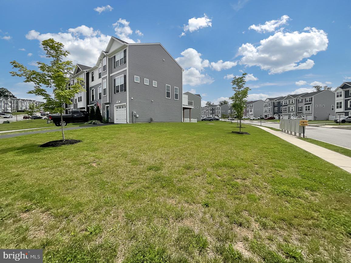 144 Overlook Dr. Hanover, PA 17331 - Photo 23 of 26 a large yard with lots of palm trees